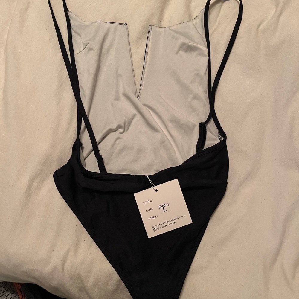Tiger mist black one piece bathing suit in a size large